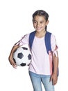 Candid photo of a Hispanic school girl holding a soccer ball isolated on a white background Royalty Free Stock Photo