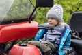 Portrait of young boy on quad bike Royalty Free Stock Photo