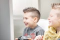 Candid portrait of a young boy playing video games