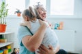 Embracing Daddys Hug A Heartwarming Moment of Fatherhood and Joyful Child Royalty Free Stock Photo