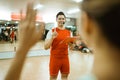 candid shot of a male gym instructor leading a briefing Royalty Free Stock Photo