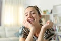 Candid woman smiling at camera at home