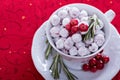 Candied cranberry in a decorative cup