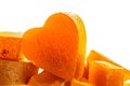 Candied fruit jelly apricot in the form of heart on isolated background Royalty Free Stock Photo