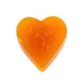 Candied fruit jelly apricot in the form of heart on isolated background Royalty Free Stock Photo