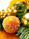 Candied fruits, golden ornaments as Christmas deco