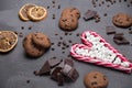 Candied grains of coffee are laid out all over the table. Big candy in the shape of a heart. Marshmallows chocolate on a gray back Royalty Free Stock Photo