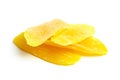 Candied mango fruit chips isolated on white background. Dry dehydrated mango slices