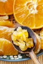 Candied orange peel and fresh juicy oranges Royalty Free Stock Photo