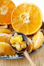 Candied orange peel and fresh juicy oranges Royalty Free Stock Photo