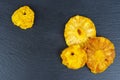 Candied pinapple rings , aka crystallized fruit on black background Royalty Free Stock Photo