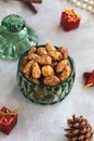 Candied or sugared almond in glass jar on Christmas background Royalty Free Stock Photo