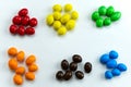 candies arranged in a handful by colors Royalty Free Stock Photo