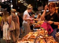 Candies and cookies exposed in market store without protection to people's germs