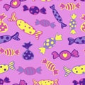 Vector seamless pattern of different candies in bright colors on a vivid purple background.