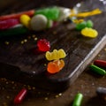 Candies on a wooden chopping board