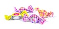 Candies wrapped in colored foil on white background