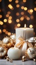 A candle against the background of New Year\'s decor made of balls and garlands. Royalty Free Stock Photo