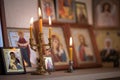 Candle against the background of orthodox icons