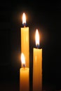 Candle against dark background