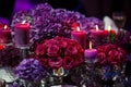 Candle and beautiful flowers on the wedding table Royalty Free Stock Photo