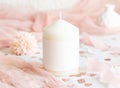 Sealed envelope near pink decorations, hearts and tulle on white table close up, mockup