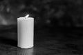 candle blowing in the wind Royalty Free Stock Photo