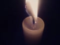 Candle burning in the dark Royalty Free Stock Photo