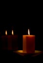 Candle burning in darkness Royalty Free Stock Photo