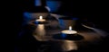 Candle is burning on the table, dark, festive dinner Royalty Free Stock Photo