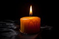 candle burns in the dark. AI Generated