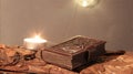 candle burns on tree bark on candle burning day with bookplate in leather binding