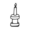 Candle in a candlestick hand drawn in doodle style. single element scandinavian hygge monochrome minimalism simple. cozy home,