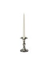 Candle on candlestick isolated on white background Royalty Free Stock Photo