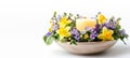 Candle Centerpiece in Ceramic Bowl with Mixed Spring Flowers.Celebration spring holiday Easter, Spring Equinox day, Ostara Sabbat