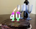 40 candle on chocloate birthday cake Royalty Free Stock Photo