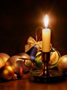 Candle and christmas balls Royalty Free Stock Photo