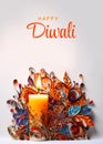 A candle with colorful swirls and a happy diwali text. Diwali, light festival