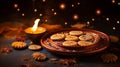 a candle and cookies are next to a candle, in the style of indian motifs, glimmering light effects, authentic details