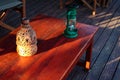 Candle cover and paraffin lamp decorations on table in safari camp Royalty Free Stock Photo