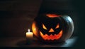 Candle and creepy smiling pumpkin for Halloween