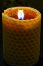 Candle on dark background. Royalty Free Stock Photo