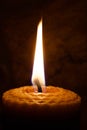 Candle on dark background. Royalty Free Stock Photo