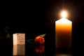 Candle in the darkness during All Saints Day Royalty Free Stock Photo