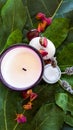 Candle and lavender cream with dried roses Royalty Free Stock Photo