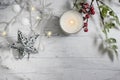 Candle, festive garland burning magic   snow interior decoration christmas background flame Royalty Free Stock Photo