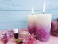 Candle cream fresh cosmetic towel on a wooden background