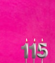 Candle 115 with flame - Birthday card in fuchsia background