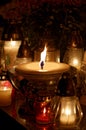 Candle flame burning at cemetery Royalty Free Stock Photo