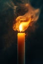 Candle Flame, A close-up view of a single candle\'s light and flame against a black background, creating a warm and inviting Royalty Free Stock Photo